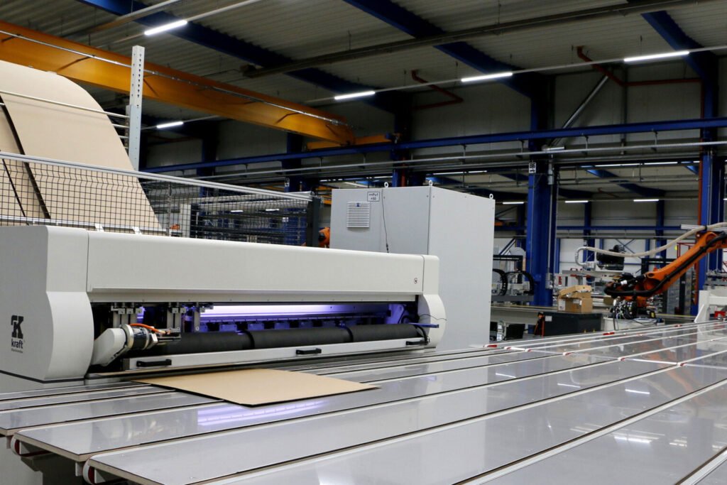 Fully automatic corrugated cardboard packaging line Fully automatic corrugated cardboard packaging line photo