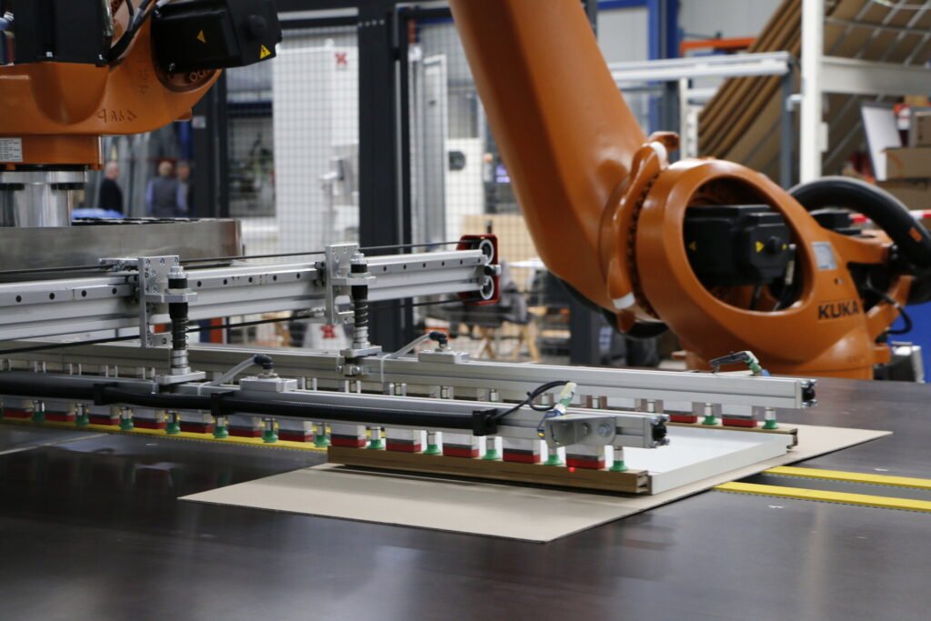 Corrugated cardboard packaging machinery for kitchen furniture Corrugated cardboard packaging machinery for kitchen furniture photo